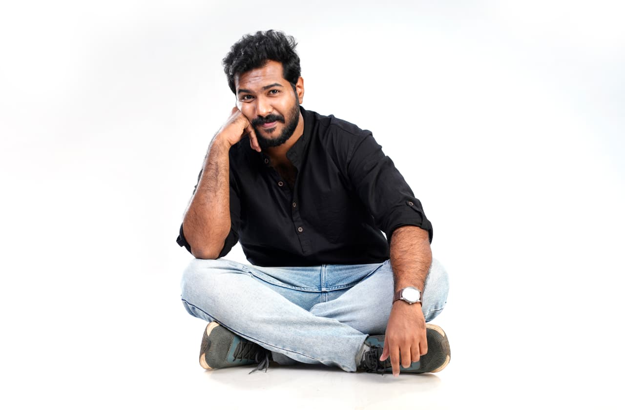 Harikrishna D seated against a white background